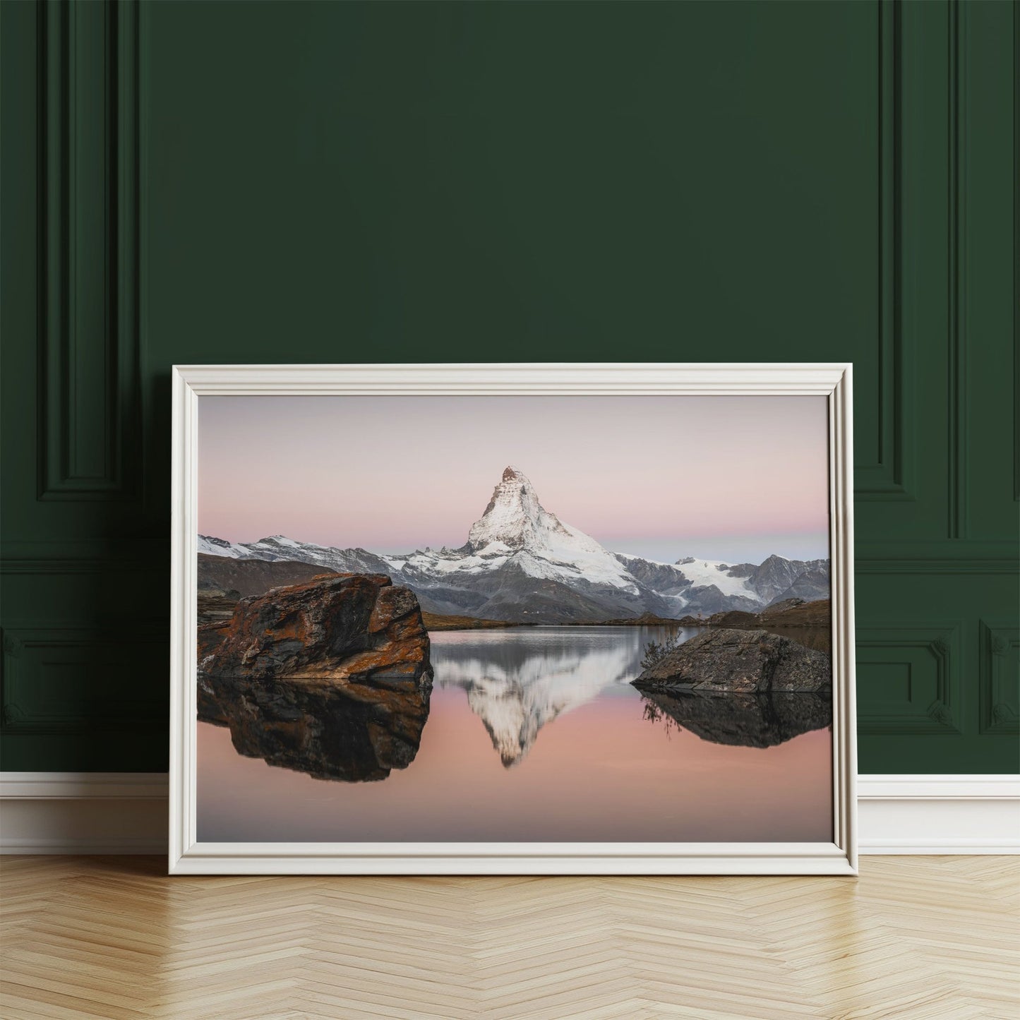 Swiss Alps landscape featuring Stellisee and the Matterhorn in peaceful evening light.