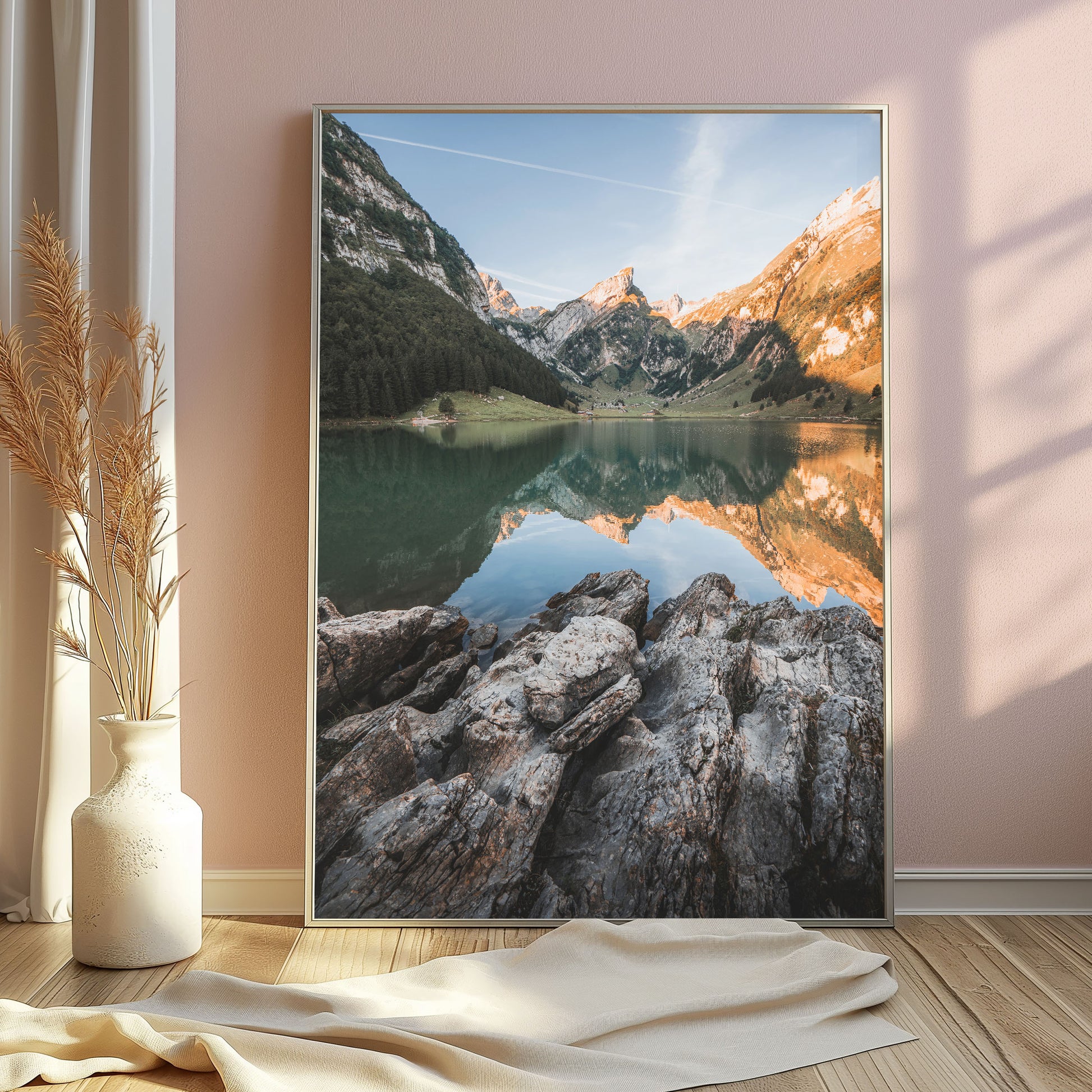 Seealpsee Lake in Switzerland, featuring tranquil water reflecting the alpine mountains and trees under morning sunlight, great for home decor.