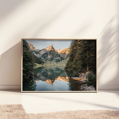 Golden hour at Seealpsee in Appenzell, Switzerland, with a yellow boat and peaceful alpine views.