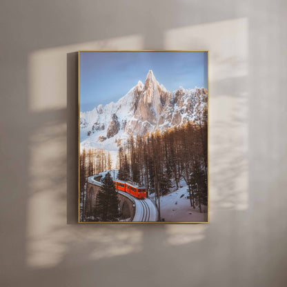 Wall art print of Train du Montenvers passing through snowy forests near Mer de Glace in Chamonix.