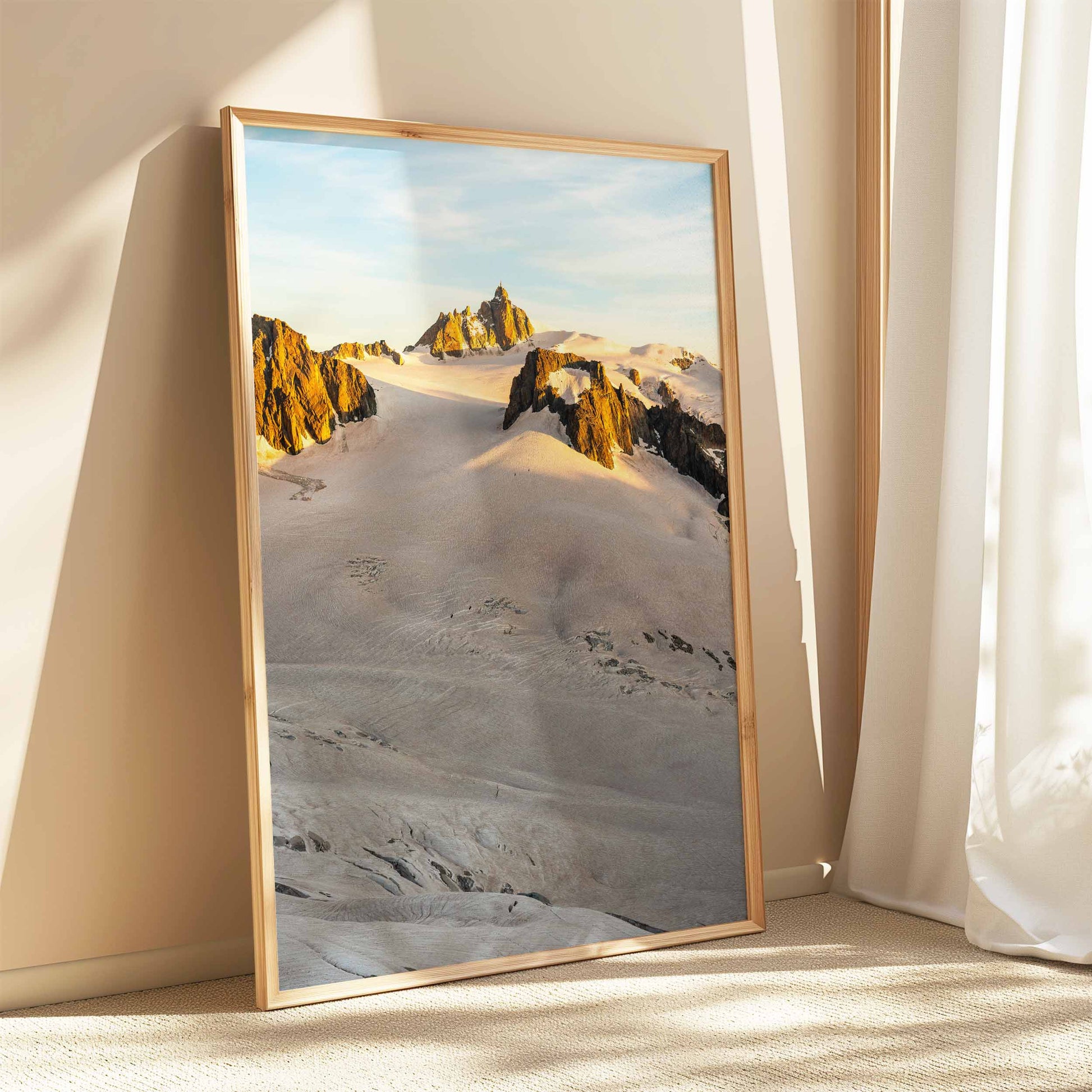 Vallée Blanche glacier at sunrise, leaning frame on cozy neutral wall.