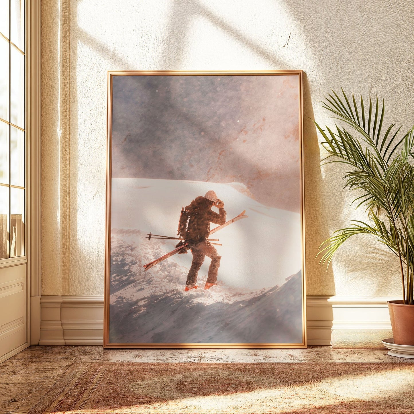 A skier carrying skis across the Vallée Blanche under soft, warm light.