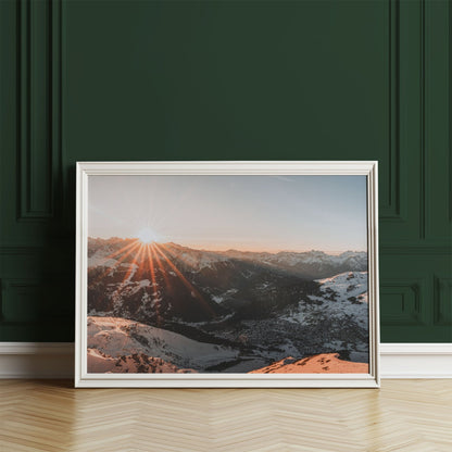 Sunset lighting up the Swiss Alps near Verbier, creating a serene mountain landscape.