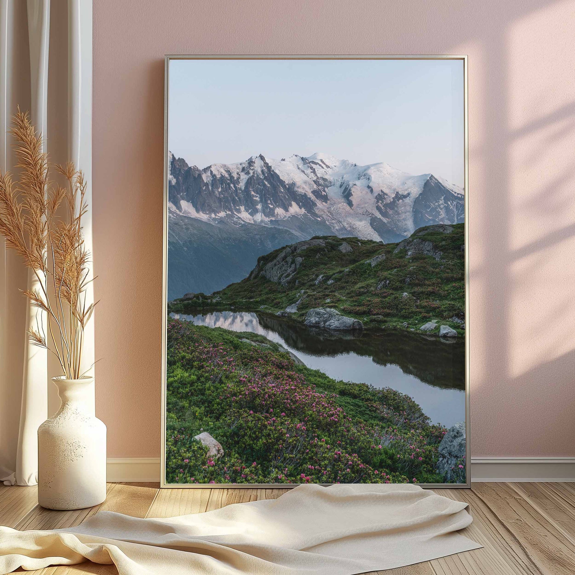 Lac de la Flégère with colorful wildflowers and Mont Blanc peaks in the distance, Chamonix.