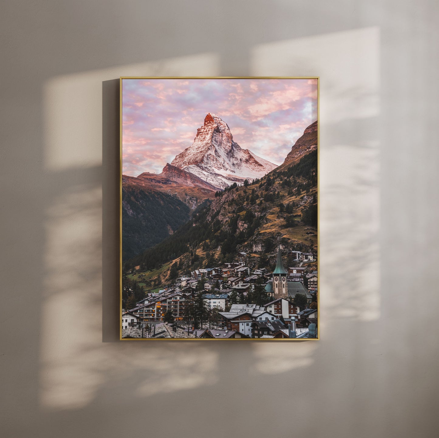 Zermatt village at sunrise with the Matterhorn mountain in the background, perfect for nature-inspired wall art.